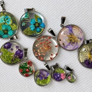 Mystery handmade pressed flower pendant